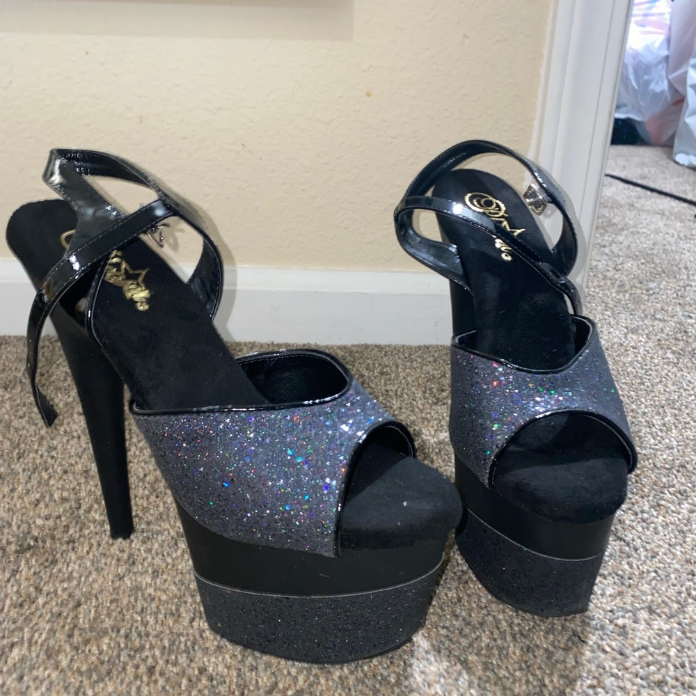 Black Pleaser heels.